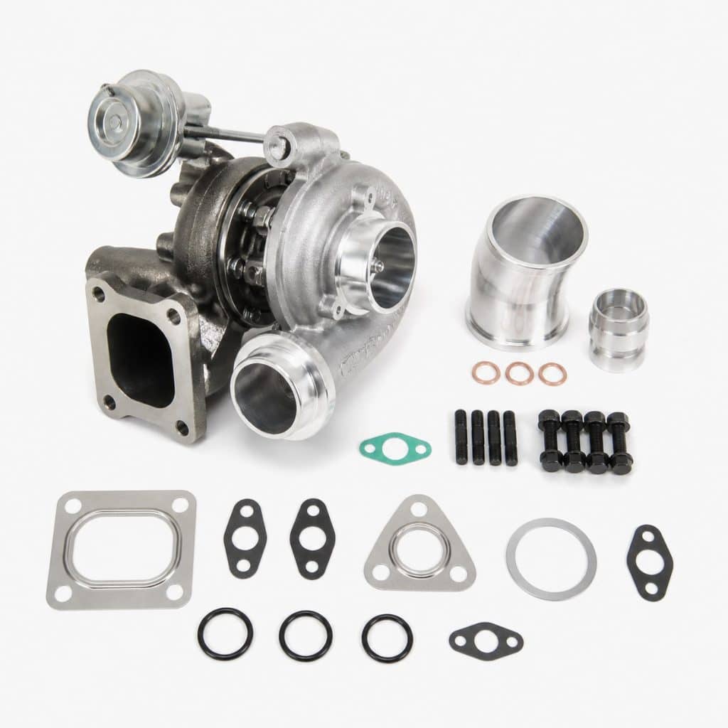 Kit turbocompresseur échange standard avec joints présenté sur fond neutre